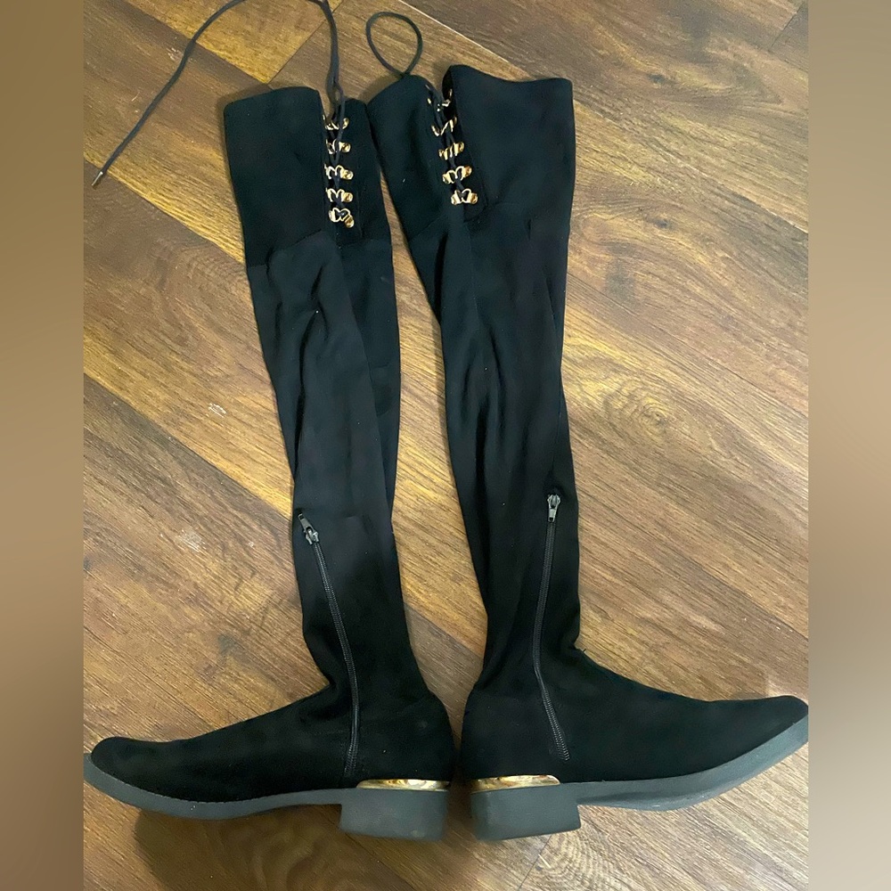 Tall black boots